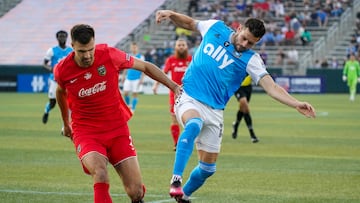 May 24, 2023; Birmingham, AL, USA; Birmingham Legion FC defender Alex Crognale (21) and Charlotte FC midfielder Brandt Bronico (13) go for the ball during the first half at Protective Stadium. Mandatory Credit: Marvin Gentry-USA TODAY Sports