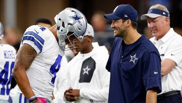 ARLINGTON, TX - OCTOBER 09: (L-R) Dak Prescott #4, quarterback of the Dallas Cowboys talks with injured quarterback Tony Romo #8 prior to the game against the Cincinnati Bengals at AT&amp;T Stadium on October 9, 2016 in Arlington, Texas.   Wesley Hitt/Getty Images/AFP
 == FOR NEWSPAPERS, INTERNET, TELCOS &amp; TELEVISION USE ONLY ==