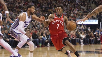 Dec 17, 2017; Toronto, Ontario, CAN; Toronto Raptors guard Kyle Lowry (7) controls a ball as Sacramento Kings guard Garrett Temple (17) defends in the third quarter at Air Canada Centre. Mandatory Credit: Nick Turchiaro-USA TODAY Sports