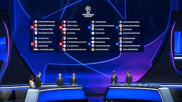 This photograph taken on August 31, 2023 shows a screen displaying the fixtures for the group stage of the UEFA Champions League football cup after the draw for the 2023/2024 UEFA Champions League football tournament at The Grimaldi Forum in the Principality of Monaco. (Photo by NICOLAS TUCAT / AFP)