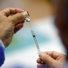 What percentage of vaccination is needed for herd immunity?