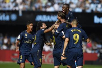 Real Madrid's players celebrate Toni Kroos scoring their second goal against Celta Vigo on Saturday afternoon.