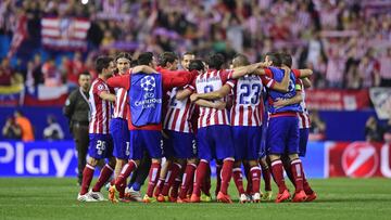 Los jugadores del Atlético celebran superar los cuartos de final.