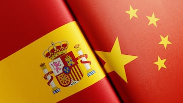 Spanish and Chinese flag pair. Horizontal composition with copy space and selective focus.