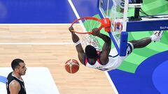 USA�s Anthony Edwards (R) dunks the ball during the FIBA Basketball World Cup group C match between USA and Jordan  at Mall of Asia Arena in Pasay, Metro Manila on August 30, 2023. (Photo by JAM STA ROSA / AFP)