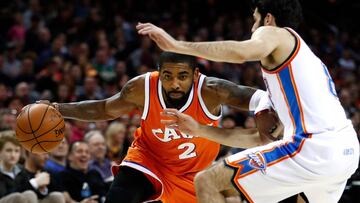 CLEVELAND, OH - JANUARY 29: Kyrie Irving #2 of the Cleveland Cavaliers tries to drive around Alex Abrines #8 of the Oklahoma City Thunder during the second half at Quicken Loans Arena on January 29, 2017 in Cleveland, Ohio. Cleveland won the game 107-91. NOTE TO USER: User expressly acknowledges and agrees that, by downloading and or using this photograph, User is consenting to the terms and conditions of the Getty Images License Agreement.   Gregory Shamus/Getty Images/AFP
 == FOR NEWSPAPERS, INTERNET, TELCOS &amp; TELEVISION USE ONLY ==