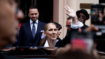 Paris 2024 Olympics - Preview - Paris, France - July 23, 2024 Singer Celine Dion waves to fans outside her hotel ahead of the Paris 2024 Olympics. REUTERS/Gonzalo Fuentes