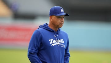 Apr 12, 2024; Los Angeles, California, USA; Los Angeles Dodgers manager Dave Roberts reacts during the game against the San Diego Padres at Dodger Stadium. Mandatory Credit: Kirby Lee-USA TODAY Sports