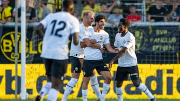 18 July 2022, Austria, Altach: Soccer, test match, Borussia Dortmund - Valencia FC. Valencia's Goncalo Guedes (center) celebrates after his goal to make it 1:3. Photo: David Inderlied/dpa (Photo by David Inderlied/picture alliance via Getty Images)