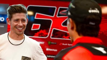 Casey Stoner con Marc Márquez en el box de Ducati de MotoGP.