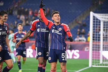 Tomás Chancalay (right) netted twice in the Revolution's comprehensive first-leg win over Alajuelense.