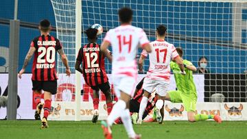 LEVERKUSEN, GERMANY - APRIL 17: Dominik Szoboszlai of RB Leipzig scores his sides 1st goal during the Bundesliga match between Bayer 04 Leverkusen and RB Leipzig at BayArena on April 17, 2022 in Leverkusen, Germany. (Photo by Alexander Scheuber/Getty Imag