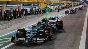 Aston Martin's Spanish driver Fernando Alonso drives through the pit lane during the qualifying session of the Bahrain Formula One Grand Prix at the Bahrain International Circuit in Sakhir on March 1, 2024. (Photo by ALI HAIDER / POOL / AFP)