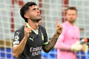 Christian Pulisic celebrates scoring the 1-0 goal during the UEFA Champions League soccer match between AC Milan and Club Brugge