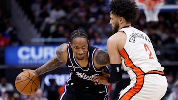 DeMar DeRozan y Cade Cunningham -