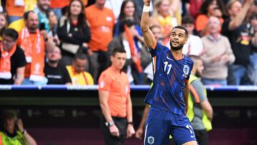 Netherlands' forward #11 Cody Gakpo celebrates scoring his team's first goal during the UEFA Euro 2024 round of 16 football match between Romania and the Netherlands at the Munich Football Arena in Munich on July 2, 2024. (Photo by Kirill KUDRYAVTSEV / AFP)