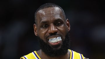 DENVER, COLORADO - APRIL 22: LeBron James #23 of the Los Angeles Lakers walks back to his bench while playing the Denver Nuggets in the fourth quarter during game two of the Western Conference First Round Playoffs at Ball Arena on April 22, 2024 in Denver, Colorado. NOTE TO USER: User expressly acknowledges and agrees that, by downloading and or using this photograph, User is consenting to the terms and conditions of the Getty Images License Agreement.   Matthew Stockman/Getty Images/AFP (Photo by MATTHEW STOCKMAN / GETTY IMAGES NORTH AMERICA / Getty Images via AFP)