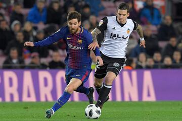 Messi y santi Mina.