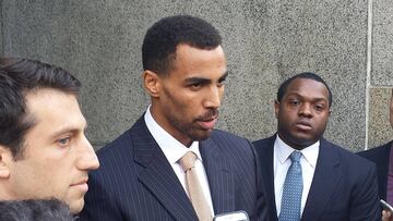 (FILES) This file photo taken on October 9, 2015 shows Swiss NBA player Thabo Sefolosha  outside the courtroom in Manhatten, thanking his family, lawyer and jurors after he was acquitted October 9, 2015 in a case stemming from a police fracas outside a  N