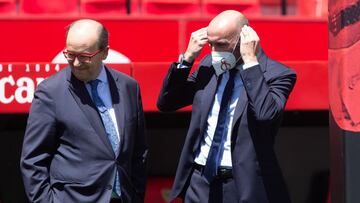 Castro, junto a Monchi.