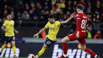 Union St-Gilloise's Algerian forward #47 Mohamed Amoura (C) kicks the ball during the UEFA Europa League football match between Union Saint Gilloise and Liverpool FC at the Lotto Park in Brussels on December 14, 2023. (Photo by Kenzo TRIBOUILLARD / AFP)