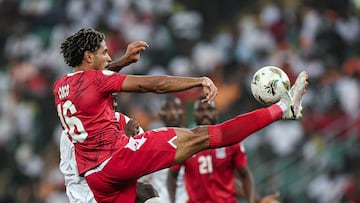 Equatorial Guinea's defender #16 Saul Coco kicks the ball during the Africa Cup of Nations (CAN) 2024 round of 16 football match between Equatorial Guinea and Guinea at the Alassane Ouattara Stadium in Ebimpe, Abidjan, on January 28, 2024. (Photo by FRANCK FIFE / AFP)