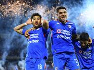 Angel Marquez celebrates his goal 2-2 with Gabriel Fernandez and Omar Campos of Cruz Azul during the quarter-final second match between Cruz Azul and Guadalajara as part of the Liga BBVA MX, Torneo Apertura 2025 at Olimpico Universitario Stadium, on November 30, 2025 in Mexico City, Mexico.