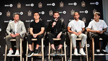 French goalkeeper Hugo Lloris (C) speaks at a press conference after signing with Los Angeles FC in Los Angeles, California, on February 14, 2024 as John Thorrington (L), LAFC Co-President and General Manager, and new signings midfielder Eduard Atuesta, forward Tomas ?Angel defender Omar Campos look on. Major League Soccer's Los Angeles FC completed the signing of French World Cup winning goalkeeper Hugo Lloris after he terminated his contract with Tottenham Hotspur on December 30, 2023. The 37-year-old was France's first-choice 'keeper when they won the 2018 World Cup by beating Croatia in the final and also played in the epic 2022 final which the French lost to Argentina on penalties. (Photo by Frederic J. Brown / AFP)