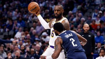 DALLAS, TX - FEBRUARY 26 : LeBron James #6 of the Los Angeles Lakers handles the ball as Kyrie Irving #2 of the Dallas Mavericks defends in the second half at American Airlines Center on February 26, 2023 in Dallas, Texas. The Lakers won 111-108. NOTE TO USER: User expressly acknowledges and agrees that, by downloading and or using this photograph, User is consenting to the terms and conditions of the Getty Images License Agreement.   Ron Jenkins/Getty Images/AFP (Photo by Ron Jenkins / GETTY IMAGES NORTH AMERICA / Getty Images via AFP)