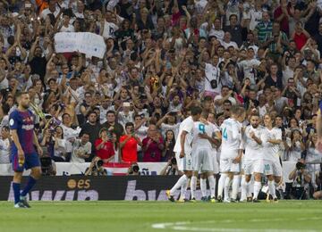 Real Madrid's players celebrate during their Spanish Super Cup win over Barcelona.