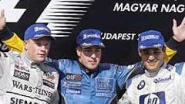 <b>PODIO HISTÓRICO.</B> En segunda posición acabó Raikkonen (McLaren) y la tercera plaza fue para Juan Pablo Montoya (Williams), quien se quedó a tan sólo un punto de Michael Schumacher en la clasificación del Mundial.
