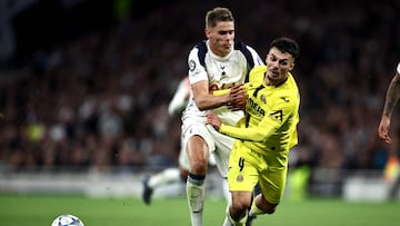 Tottenham Hotspur's Dutch defender #37 Micky van de Ven collides with Villarreal's Dutch French born Georgian striker #09 Georges Mikautadze during the UEFA Champions League football league stage match between Tottenham Hotspur and Villarreal at the Tottenham Hotspur Stadium in London, on September 16, 2025. (Photo by HENRY NICHOLLS / AFP)
