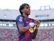 Barcelona's Spanish forward #10 Lamine Yamal celebrates after Barcelona's Spanish forward #07 Ferran Torres (not seen) scored his team's second goal during the Spanish league football match between FC Barcelona and RCD Espanyol at the Camp Nou stadium in Barcelona on April 11 , 2026. (Photo by Josep LAGO / AFP)