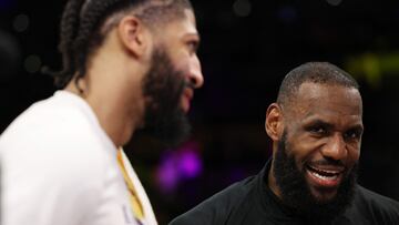 LOS ANGELES, CALIFORNIA - MAY 12: LeBron James #6 and Anthony Davis #3 of the Los Angeles Lakers react following the 122-101 victory against the Golden State Warriors in game six of the Western Conference Semifinal Playoffs at Crypto.com Arena on May 12, 2023 in Los Angeles, California. NOTE TO USER: User expressly acknowledges and agrees that, by downloading and or using this photograph, User is consenting to the terms and conditions of the Getty Images License Agreement.   Harry How/Getty Images/AFP (Photo by Harry How / GETTY IMAGES NORTH AMERICA / Getty Images via AFP)