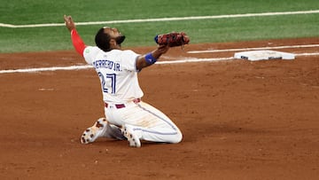 TORONTO, ONTARIO - OCTOBER 20: Vladimir Guerrero Jr. #27 of the Toronto Blue Jays celebrates on the field after defeating the Seattle Mariners in game seven of the American League Championship Series at the Rogers Centre on October 20, 2025 in Toronto, Ontario. Cole Burston/Getty Images/AFP (Photo by Cole Burston / GETTY IMAGES NORTH AMERICA / Getty Images via AFP)