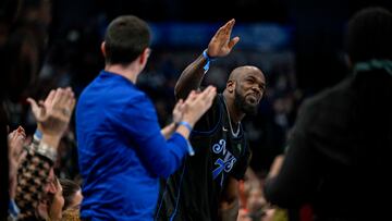 Nov 28, 2023; Dallas, Texas, USA; Texas Rangers right fielder Adolis Garcia waves to the crowd during the second quarter of the game between the Dallas Mavericks and the Houston Rockets at the American Airlines Center. Mandatory Credit: Jerome Miron-USA TODAY Sports