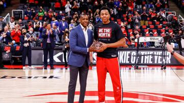 TORONTO, CANADA - APRIL 23: Scottie Barnes #4 of the Toronto Raptors accepts Rookie of the Year Award from Masai Ujiri the president of Toronto Raptors before Round 1 Game 4 of the 2022 NBA Playoffs against Philadelphia 76ers on April 23, 2022 at the Scotiabank Arena in Toronto, Ontario, Canada. NOTE TO USER: User expressly acknowledges and agrees that, by downloading and or using this Photograph, user is consenting to the terms and conditions of the Getty Images License Agreement. Mandatory Copyright Notice: Copyright 2022 NBAE (Photo by Vaughn Ridley/NBAE via Getty Images)