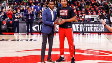 TORONTO, CANADA - APRIL 23: Scottie Barnes #4 of the Toronto Raptors accepts Rookie of the Year Award from Masai Ujiri the president of Toronto Raptors before Round 1 Game 4 of the 2022 NBA Playoffs against Philadelphia 76ers on April 23, 2022 at the Scotiabank Arena in Toronto, Ontario, Canada.  NOTE TO USER: User expressly acknowledges and agrees that, by downloading and or using this Photograph, user is consenting to the terms and conditions of the Getty Images License Agreement.  Mandatory Copyright Notice: Copyright 2022 NBAE (Photo by Vaughn Ridley/NBAE via Getty Images)