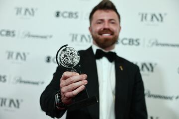 Tim Lutkin poses with the award for the Best Lighting Design of a Play for "Life of Pi" at the 76th Annual Tony Awards in New York City, U.S., June 11, 2023. REUTERS/Amr Alfiky