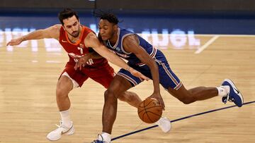 NEW YORK, NEW YORK - JANUARY 10: Facundo Campazzo #7 of the Denver Nuggets tries to steal the ball from Immanuel Quickley #5 of the New York Knicks in the first half at Madison Square Garden on January 10, 2021 in New York City. NOTE TO USER: User expressly acknowledges and agrees that, by downloading and or using this photograph, User is consenting to the terms and conditions of the Getty Images License Agreement. Elsa/Getty Images/AFP
== FOR NEWSPAPERS, INTERNET, TELCOS & TELEVISION USE ONLY ==