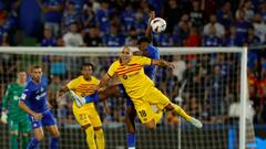 Barcelona's Spanish midfielder #18 Oriol Romeu vies with Getafe's Honduran forward #17 Anthony Lozano during the Spanish Liga football match between Getafe CF and FC Barcelona at the Col. Alfonso Perez stadium in Getafe on August 13, 2023. (Photo by JAVIER SORIANO / AFP)