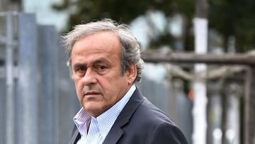 (FILES) This file photo taken on August 31, 2020 shows former head of European football's governing body UEFA, Michel Platini arriving at the building of the Office of the Attorney General of Switzerland to a hearing summoned by Swiss prosecutor Thomas Hildbrand in Bern. - Michel Platini and Sepp Blatter each face interrogation from the Swiss public prosecutor this week as part of the of the proceedings opened in 2015 over a 2011 payment of 2 million Swiss francs. (Photo by Fabrice COFFRINI / AFP)