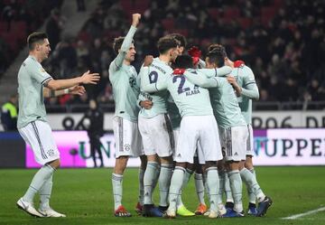 Soccer Football - Bundesliga - Hannover 96 v Bayern Munich - HDI-Arena, Hanover, Germany - December 15, 2018 Bayern Munich's Serge Gnabry (hidden) celebrates scoring their third goal with Thomas Mueller and team mates