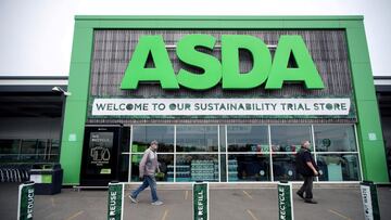 FILE PHOTO: Shoppers walk past the UK supermarket Asda, in Leeds, Britain, October 19, 2020. REUTERS/Molly Darlington/File Photo