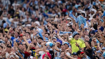 LUSAIL CITY, QATAR - DECEMBER 13: Fans of Argentina celebrate during the FIFA World Cup Qatar 2022 semi final match between Argentina and Croatia at Lusail Stadium on December 13, 2022 in Lusail City, Qatar. (Photo by Markus Gilliar - GES Sportfoto/Getty Images)