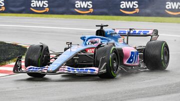 Jun 18, 2022; Montreal, Quebec, CAN; Alpine driver Fernando Alonso of Spain races in the senna turn during the qualifying session at Circuit Gilles Villeneuve. Mandatory Credit: David Kirouac-USA TODAY Sports