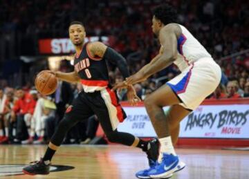 Damian Lillard y DeAndre Jordan.