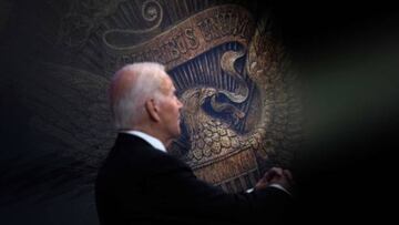 The great seal of the United States is seen as US President Joe Biden speaks about the economy during an event in the Eisenhower Executive Office Building.