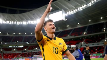 DOHA, QATAR - JUNE 07: Ajdin Hrustic of Australia celebrates after their sides victory during the 2022 FIFA World Cup Playoff match between United Arab Emirates and Australia at Ahmad Bin Ali Stadium on June 07, 2022 in Doha, Qatar. (Photo by Mohamed Farag/Getty Images)