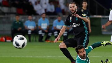 Soccer Football - FIFA Club World Cup Semi Final - Al Jazira vs Real Madrid - Zayed Sports City Stadium, Abu Dhabi, United Arab Emirates - December 13, 2017   Real Madrid&rsquo;s Karim Benzema strikes the post with a shot   REUTERS/Matthew Childs